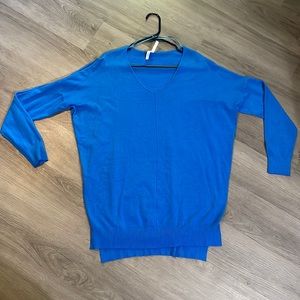 Cobalt blue v-neck sweater with splits on side